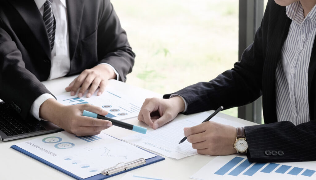 Business project team working together at meeting room at office Mature businessman discuss information with a younger colleague.